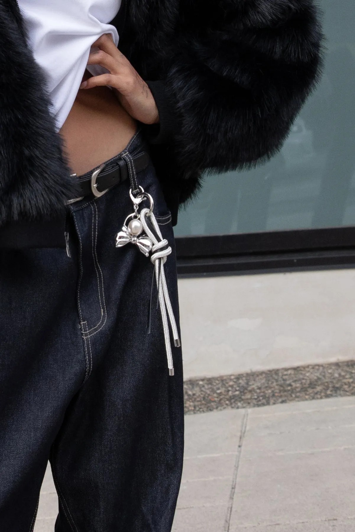 LEATHER AND GOLD ROPE BAG CHARM sold by OAK AND FORT