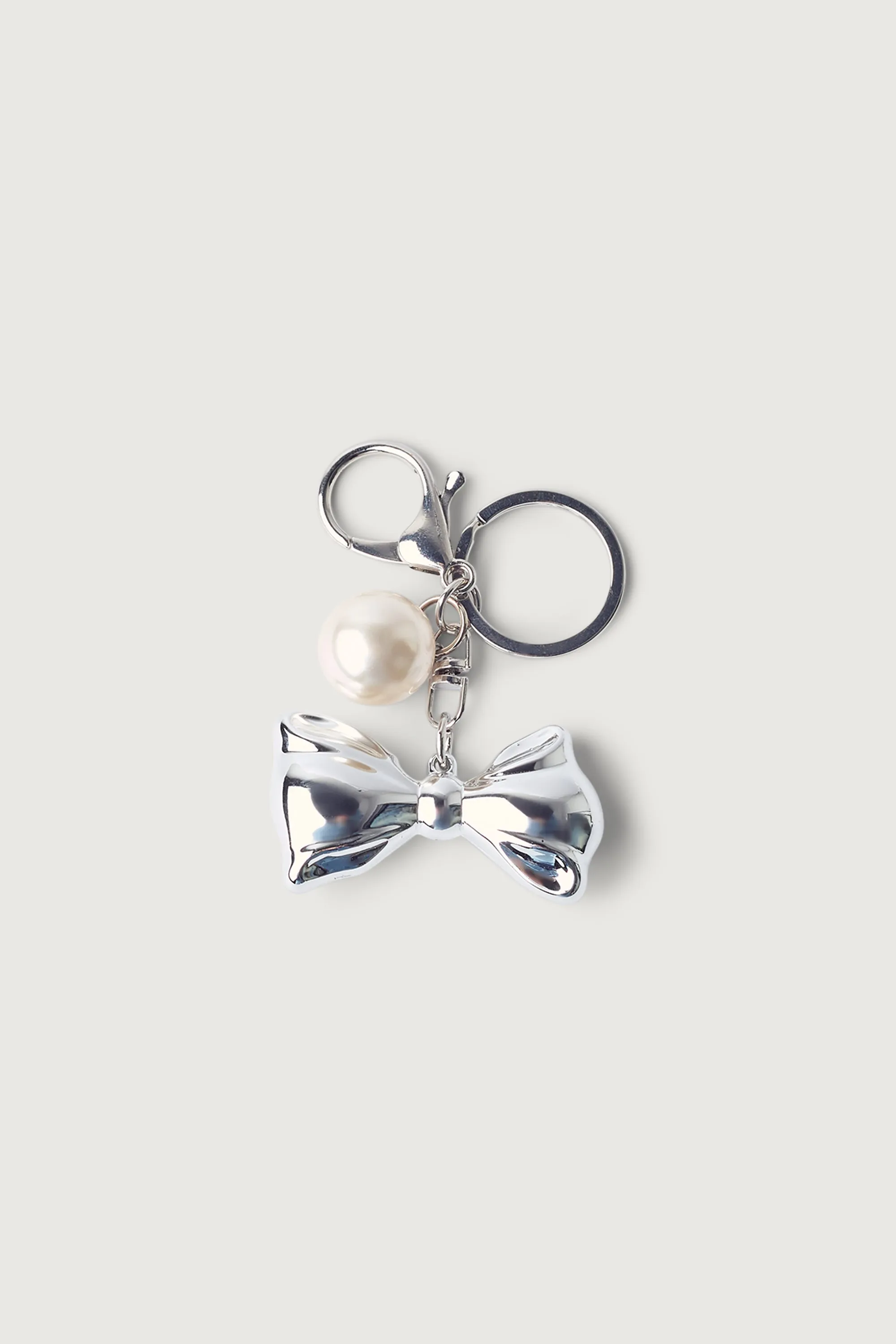 BOW AND PEARL BAG CHARM sold by OAK AND FORT