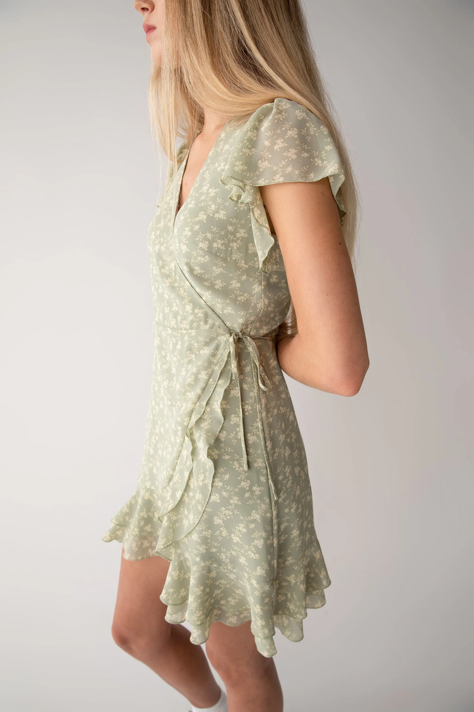 FLORAL WRAP MINI DRESS WITH RUFFLED HEM sold by OAK AND FORT product image thumbnail 4
