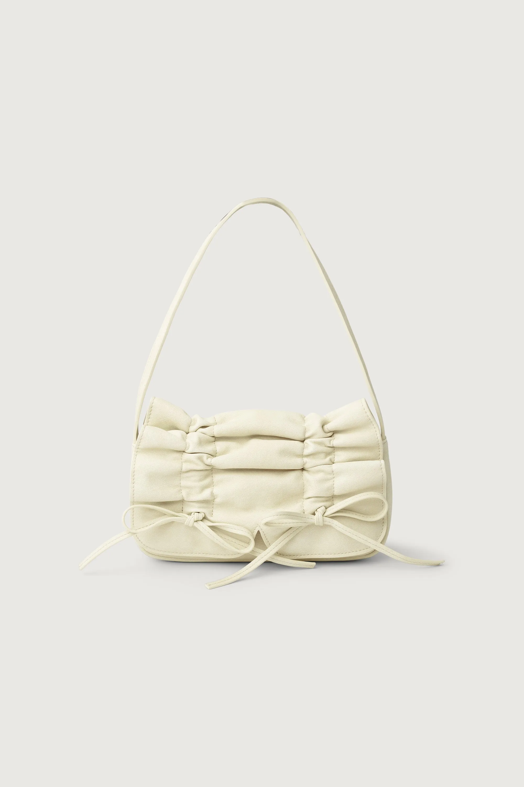 BOW-DETAILED RUCHED SHOULDER BAG sold by OAK AND FORT
