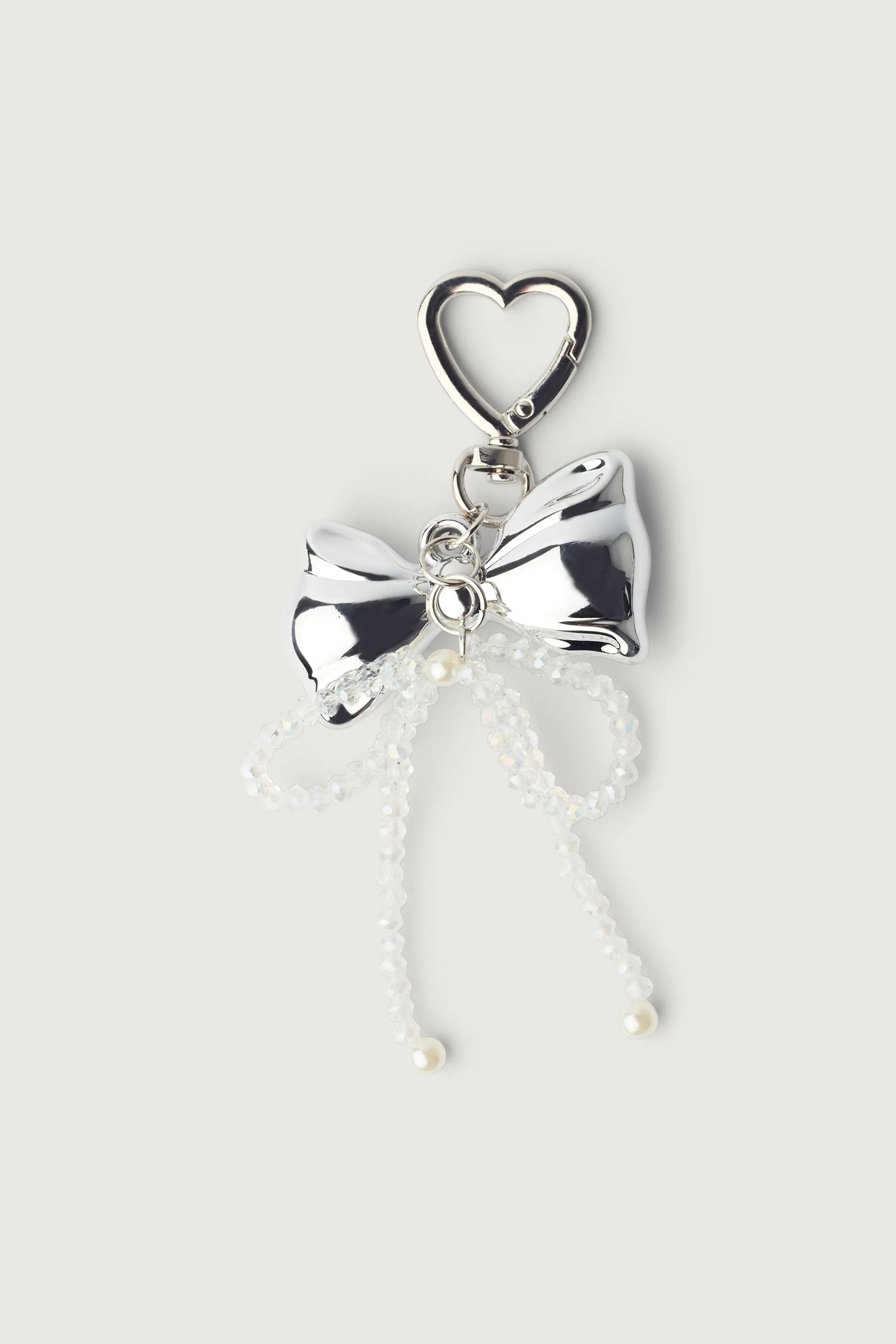 BEADED CHROME RIBBON BAG CHARM sold by OAK AND FORT