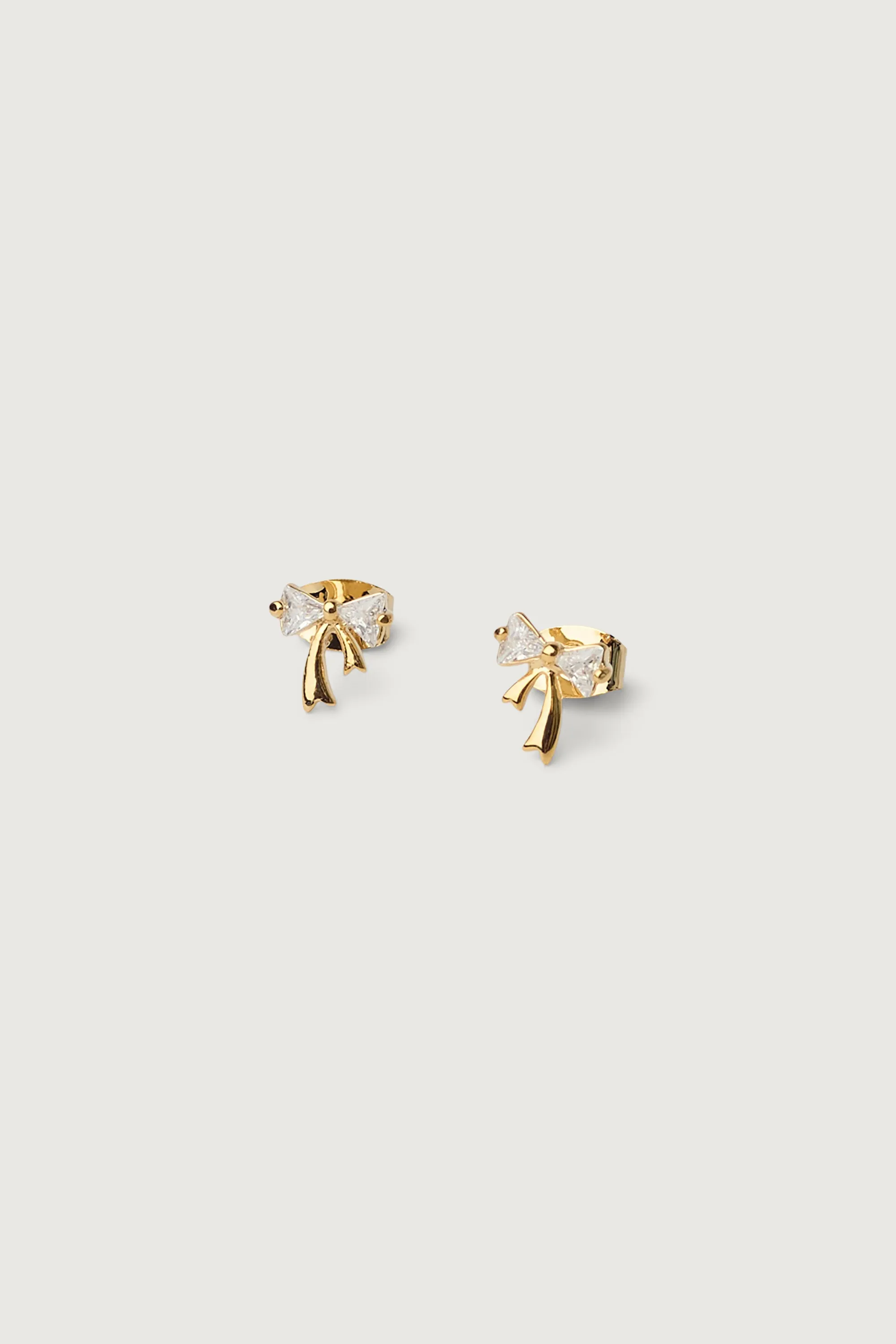 SPARKLY BOW STUD EARRINGS sold by OAK AND FORT