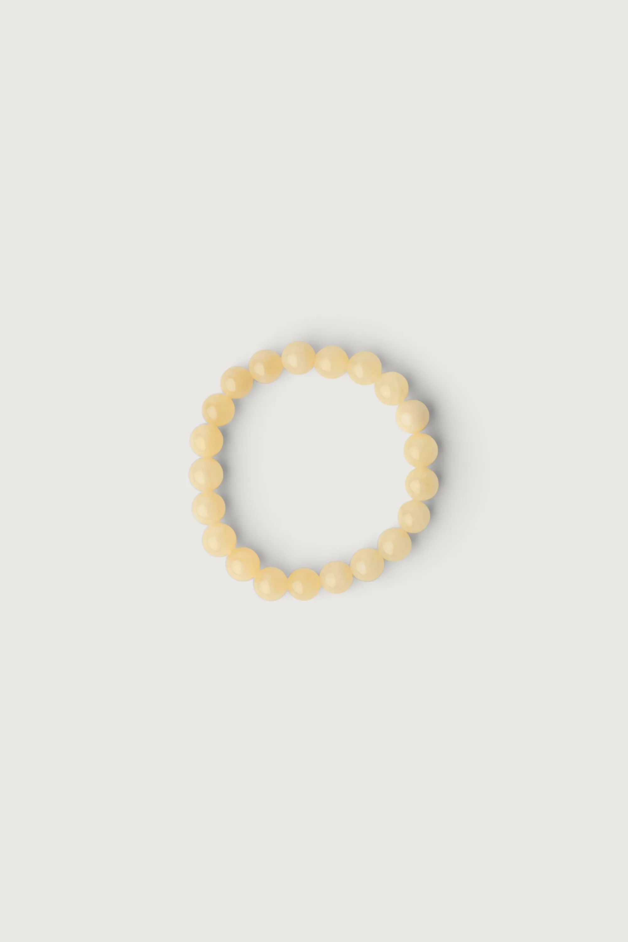 YELLOW STONE BEAD BRACELET sold by OAK AND FORT