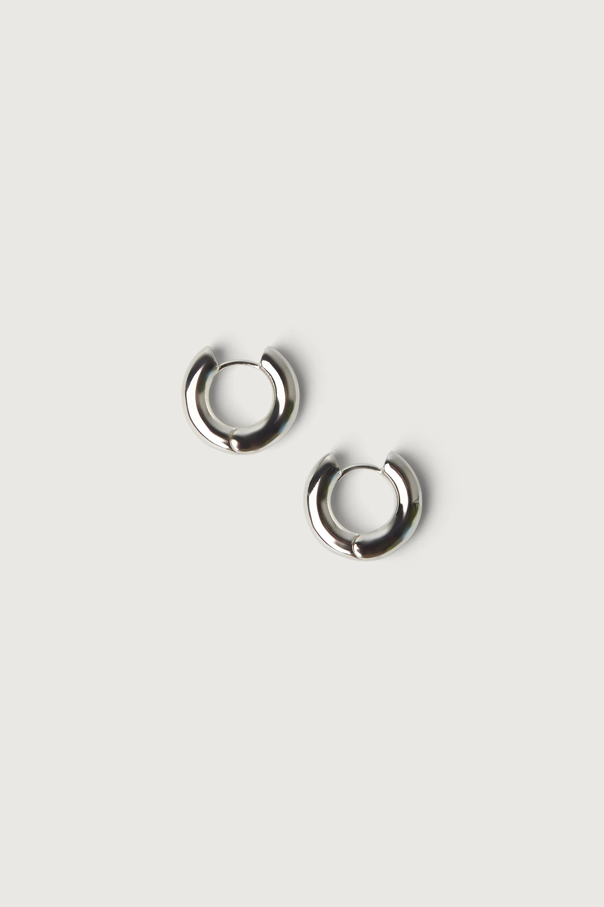 MINIMAL HUGGIE HOOP EARRINGS sold by OAK AND FORT product image thumbnail 4