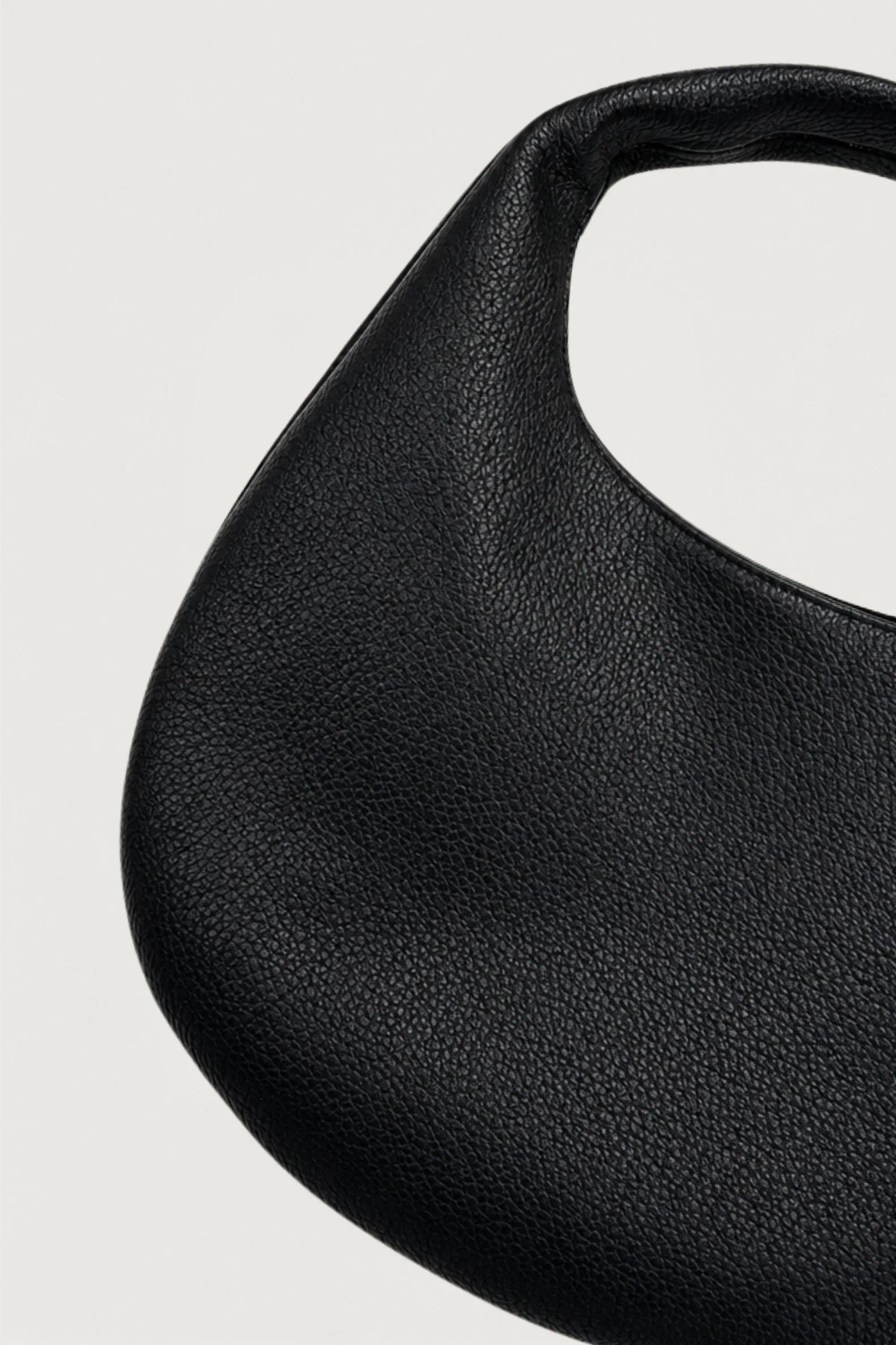 CURVED LEATHER HAND BAG sold by OAK AND FORT product image thumbnail 3