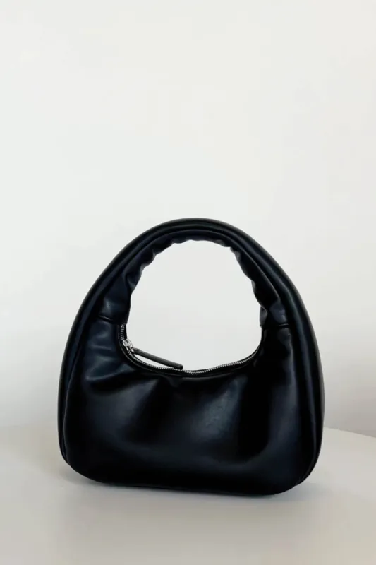 SMALL PADDED HANDBAG sold by OAK AND FORT