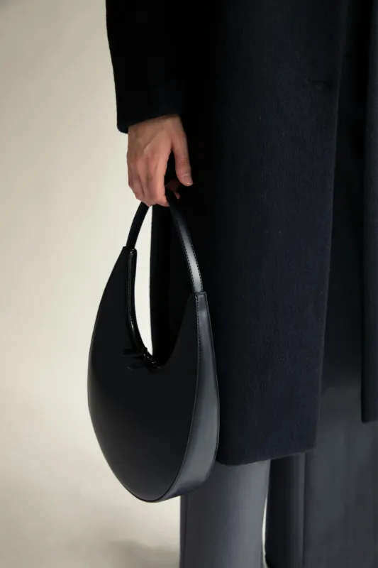 STRUCTURED CURVED SHOULDER BAG sold by OAK AND FORT