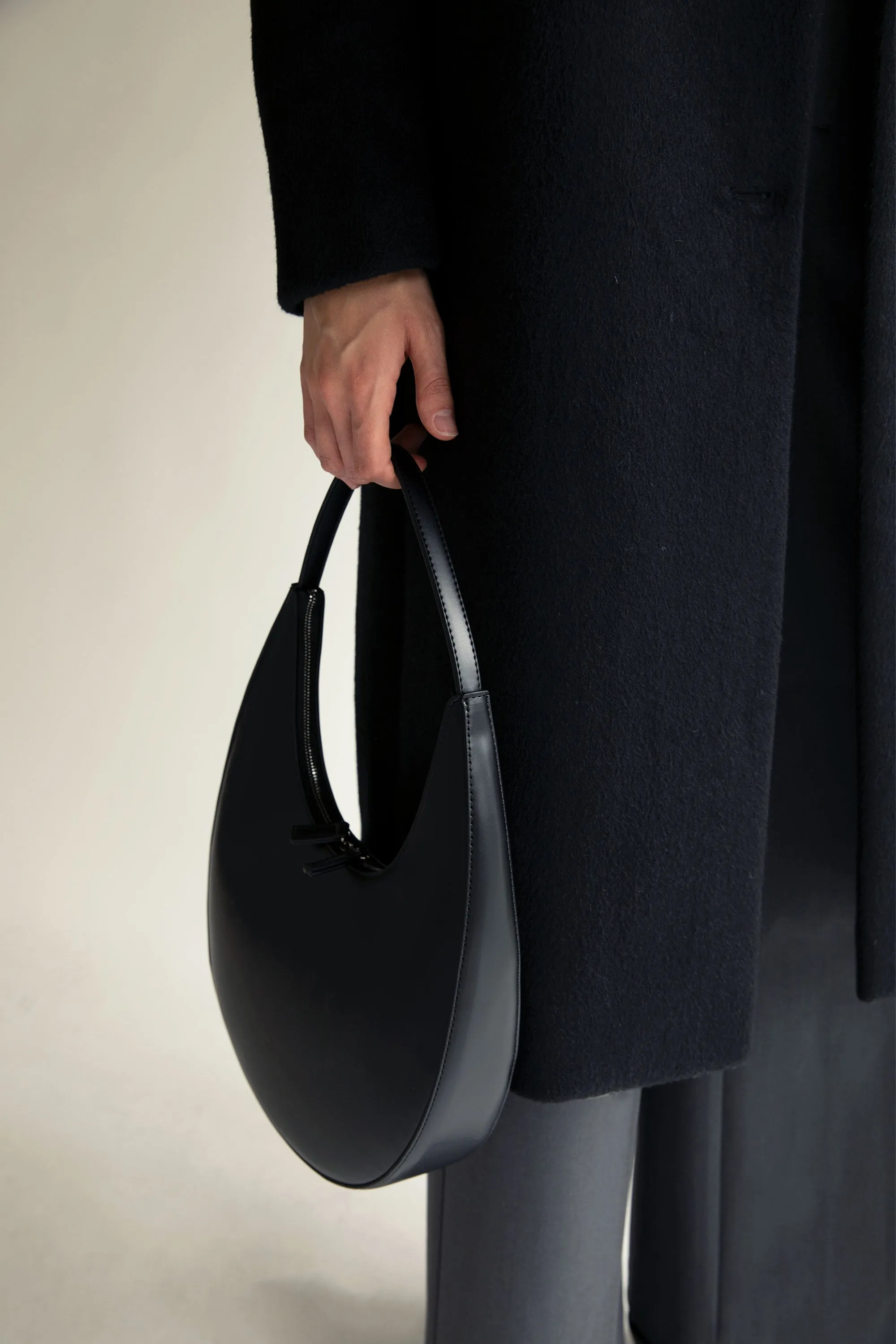 STRUCTURED CURVED SHOULDER BAG sold by OAK AND FORT