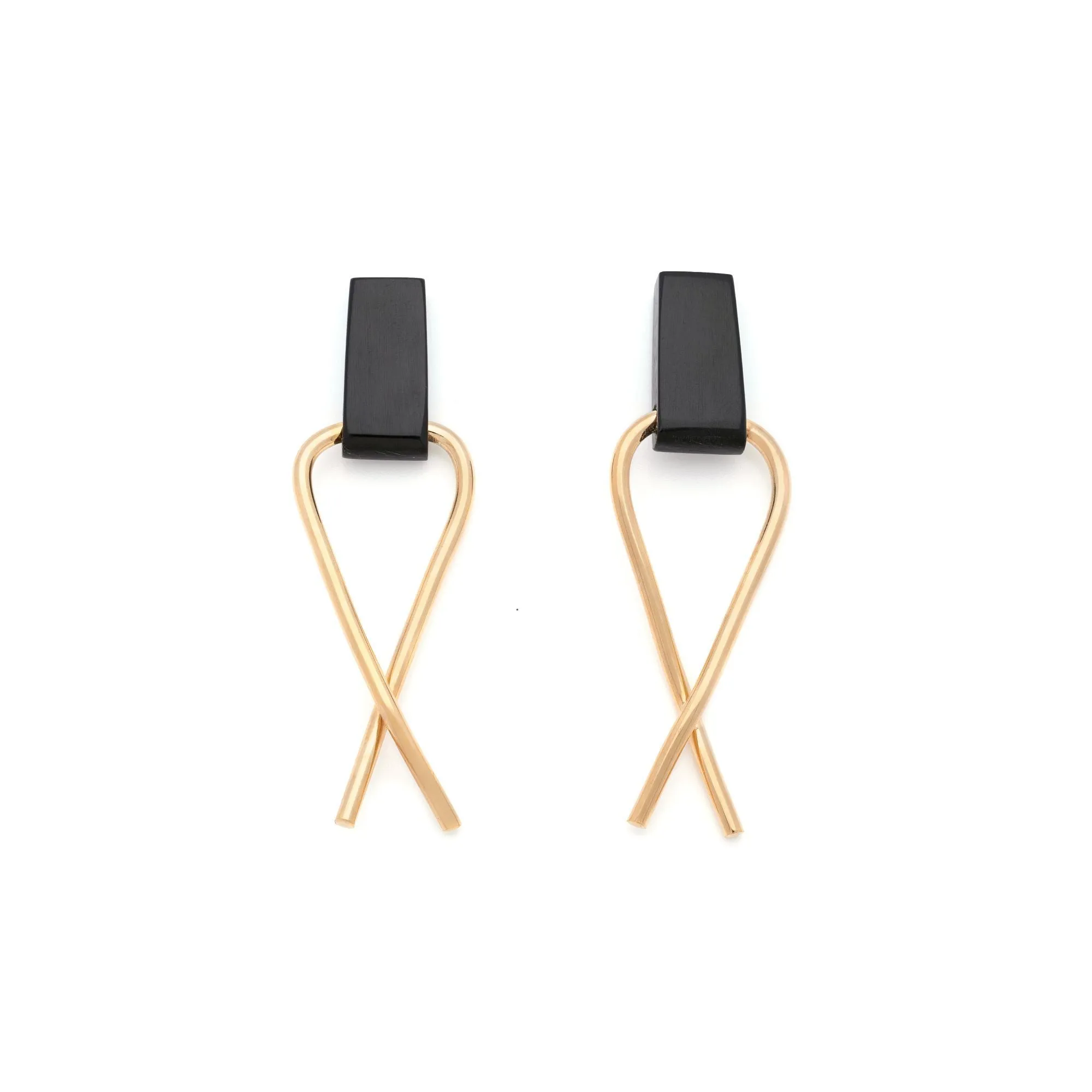 Cross-over Horn Earrings sold by Obakki