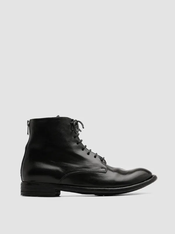 LEXIKON 123 - Black Zipped Leather Ankle Boots sold by Officine Creative