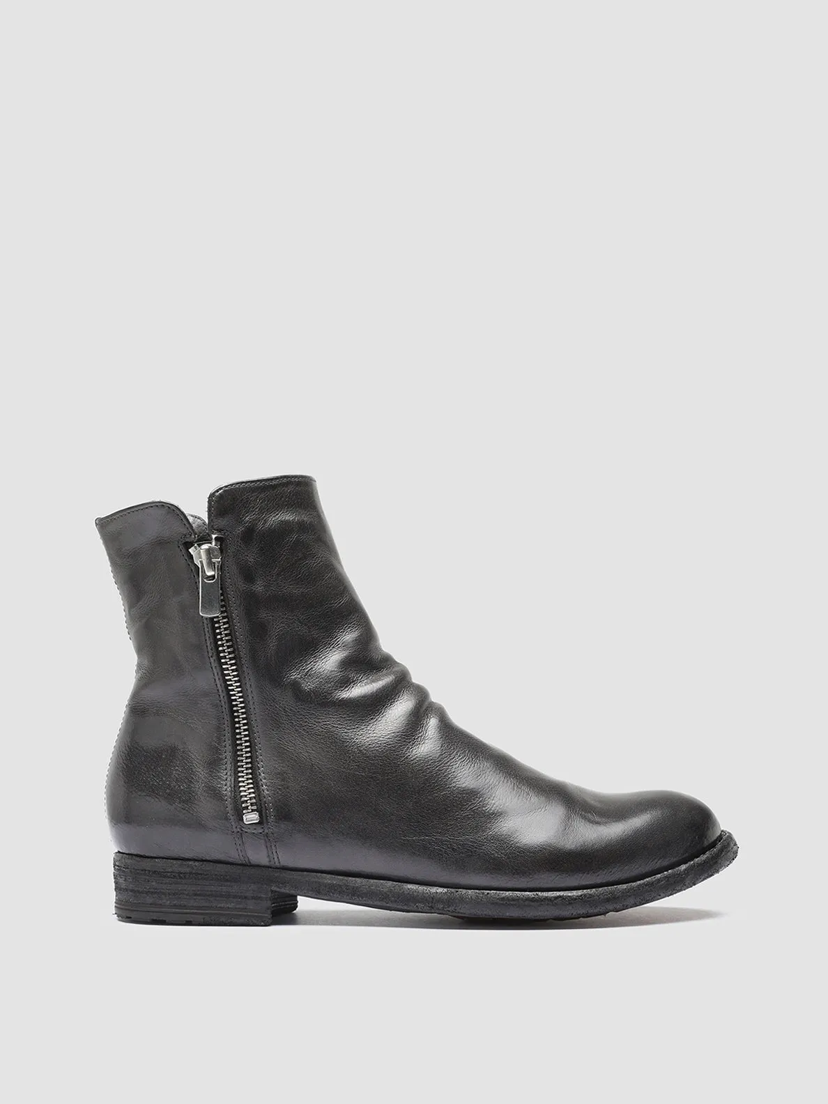 LEXIKON 097 - Gray Leather and Shearling Ankle Boots sold by Officine Creative