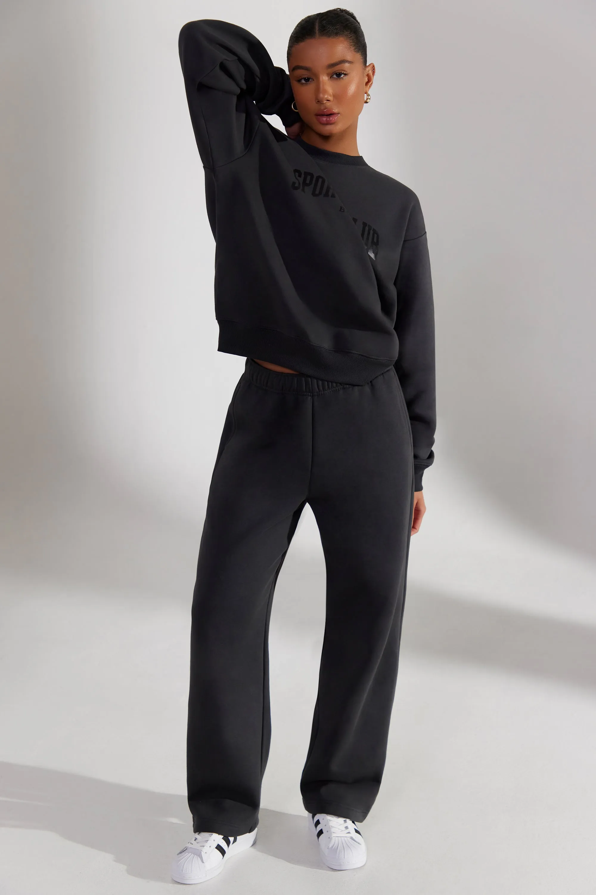 Petite Wide Leg Joggers in Washed Black sold by Oh Polly