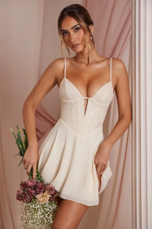 Plunge Neck Lace Corset Mini Dress in Ivory sold by Oh Polly