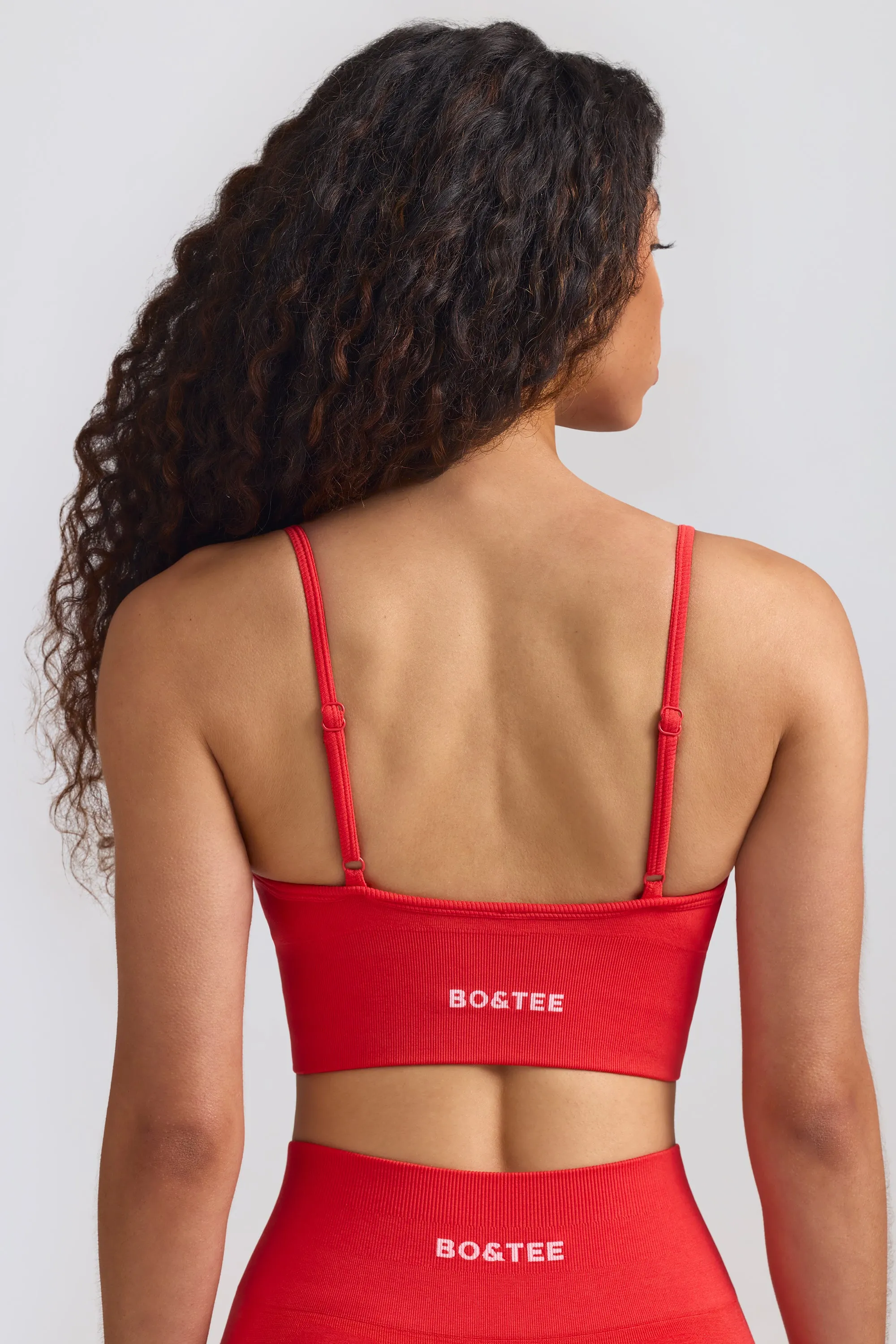 Define Luxe V-Neck Sports Bra in Poppy Red sold by Oh Polly product image thumbnail 2