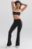 Petite Soft Active Contrast-Trim Flared Trousers in Black sold by Oh Polly