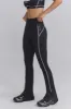 Petite Soft Active Contrast-Trim Flared Trousers in Black sold by Oh Polly