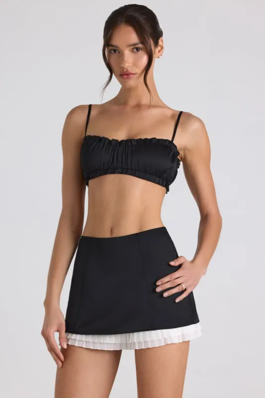 Layered Mid-Rise Mini Skirt in Black sold by Oh Polly