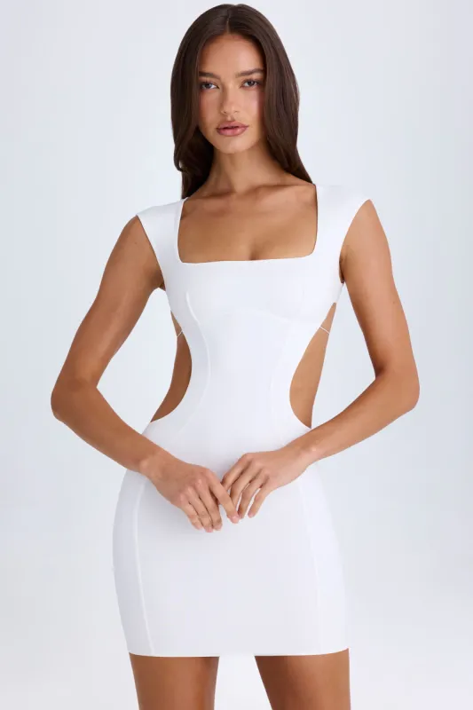 Cut-Out Lace-Up Mini Dress in White sold by Oh Polly