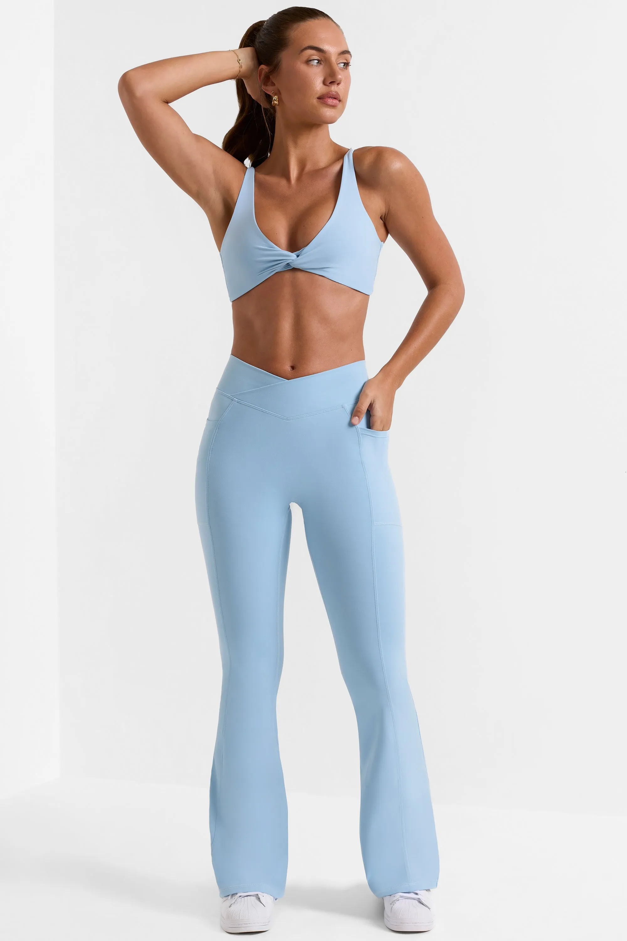 Petite Cross Waistband Flare Pocket Leggings in Ice Blue sold by Oh Polly product image thumbnail 5