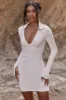 Long Sleeve Ruched Mini Dress in Beige sold by Oh Polly