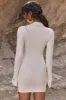 Long Sleeve Ruched Mini Dress in Beige sold by Oh Polly
