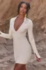 Long Sleeve Ruched Mini Dress in Beige sold by Oh Polly