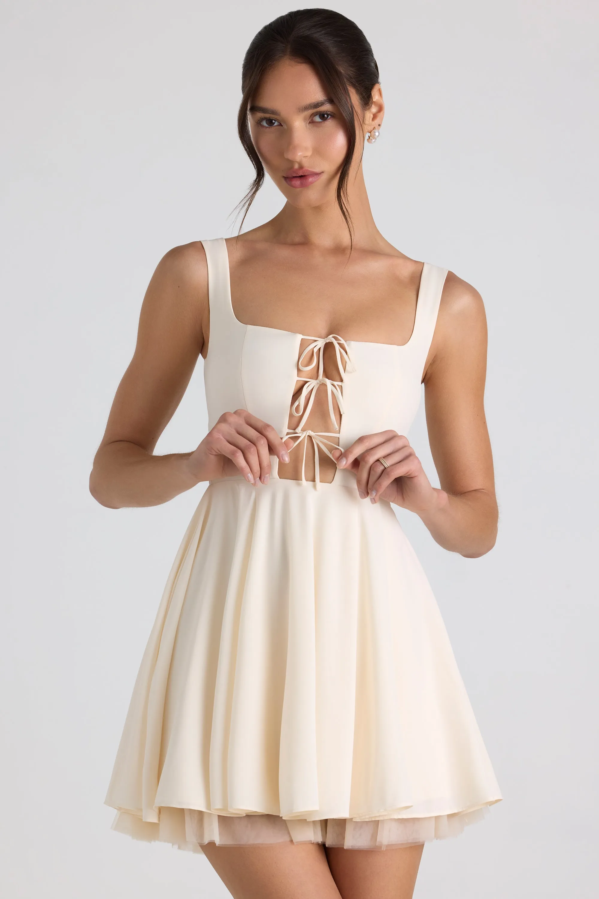 Tie-Detail A-Line Micro Mini Dress in Ivory sold by Oh Polly