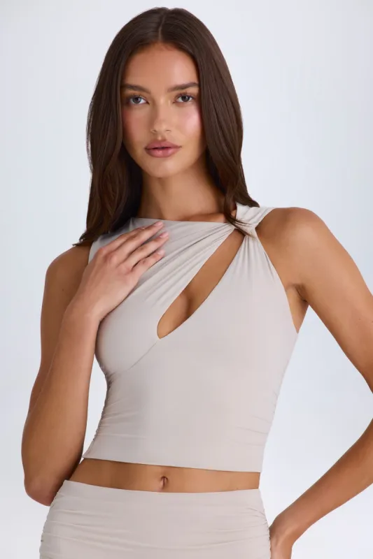 Twisted Cut-Out Tank Top in Taupe sold by Oh Polly