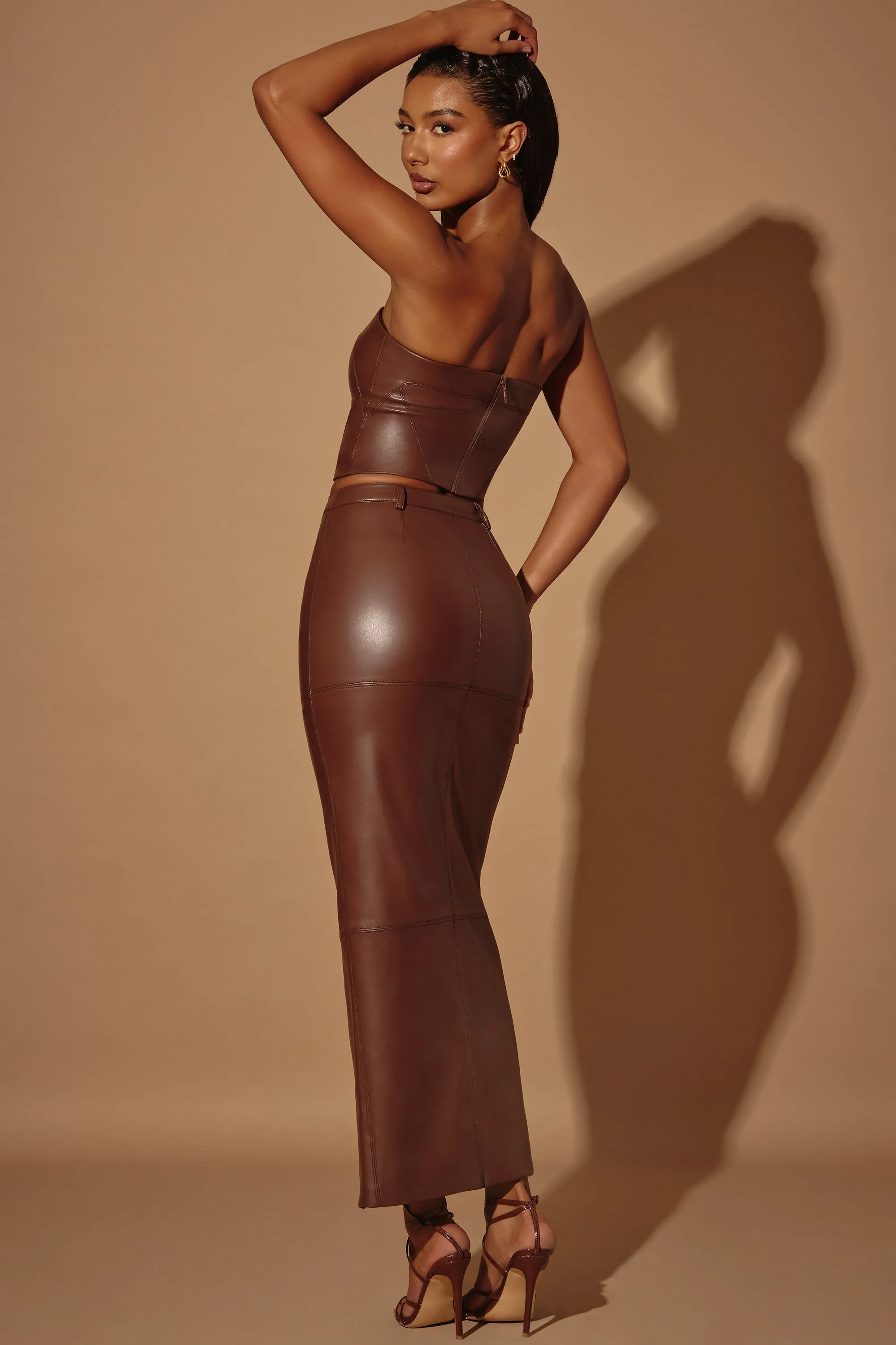 Mid-Rise Vegan Leather Maxi Skirt in Brown sold by Oh Polly product image thumbnail 2