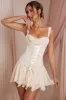 Lace Up Corset Mini Dress in Ivory sold by Oh Polly