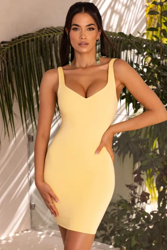 Here Comes The Sun V Neck Mini Dress in Yellow sold by Oh Polly