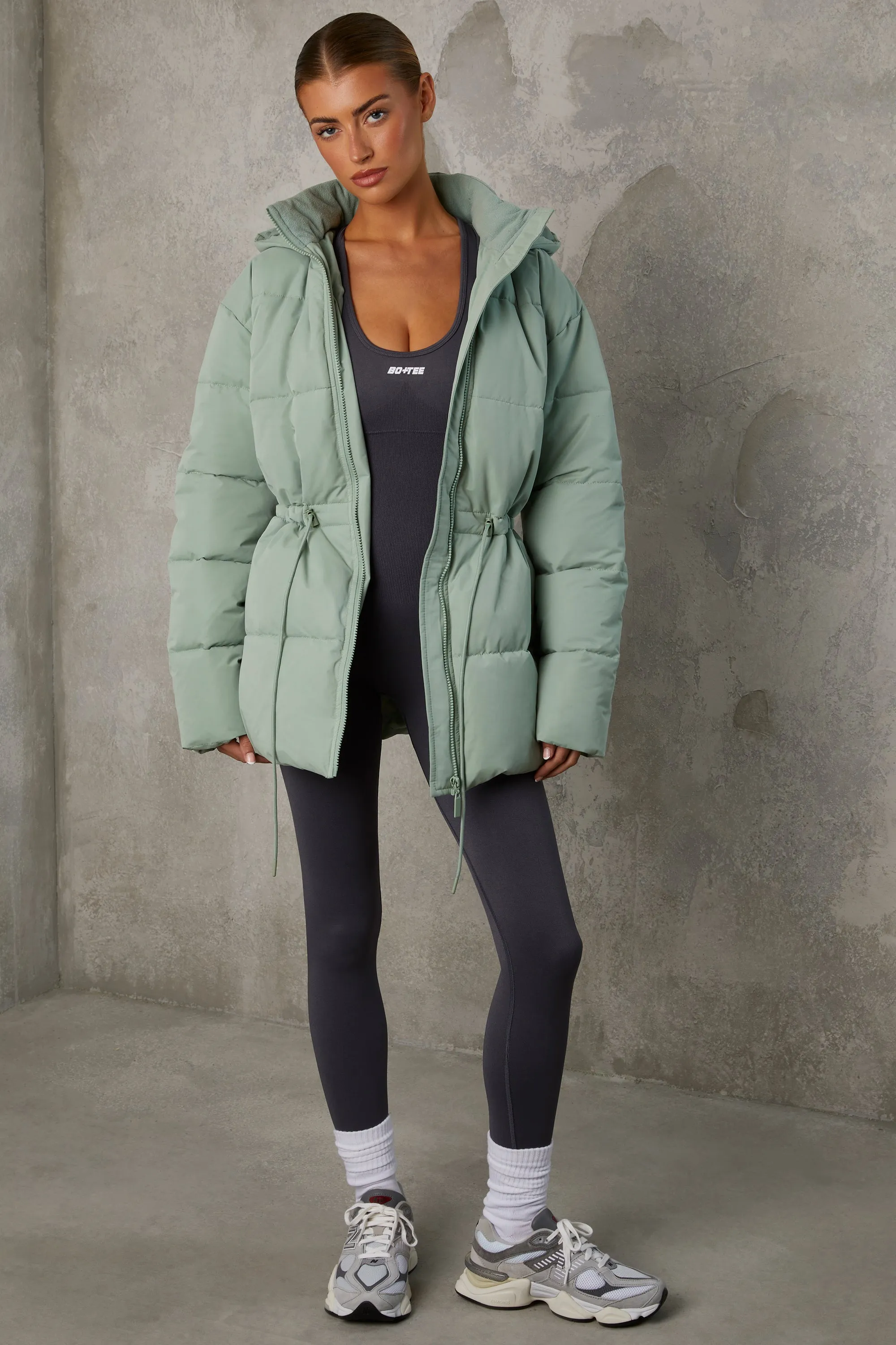 Mid Length Hooded Puffer Coat in Iceberg Green sold by Oh Polly product image thumbnail 5