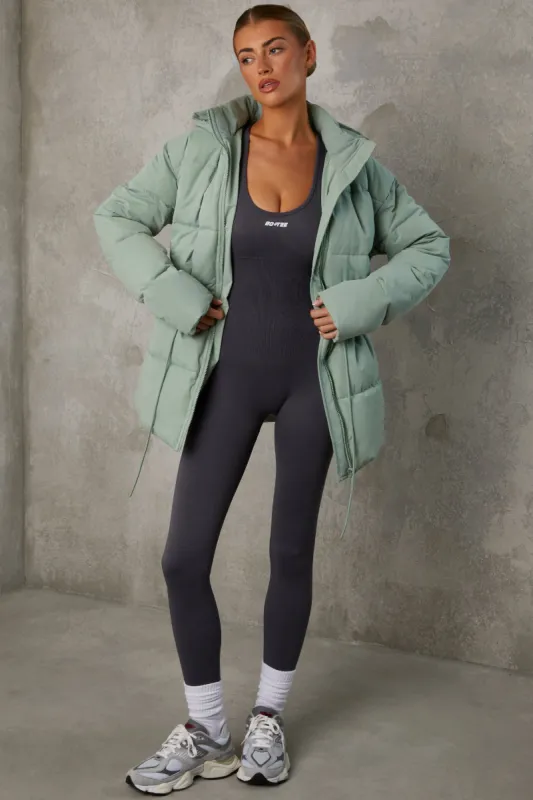 Mid Length Hooded Puffer Coat in Iceberg Green sold by Oh Polly