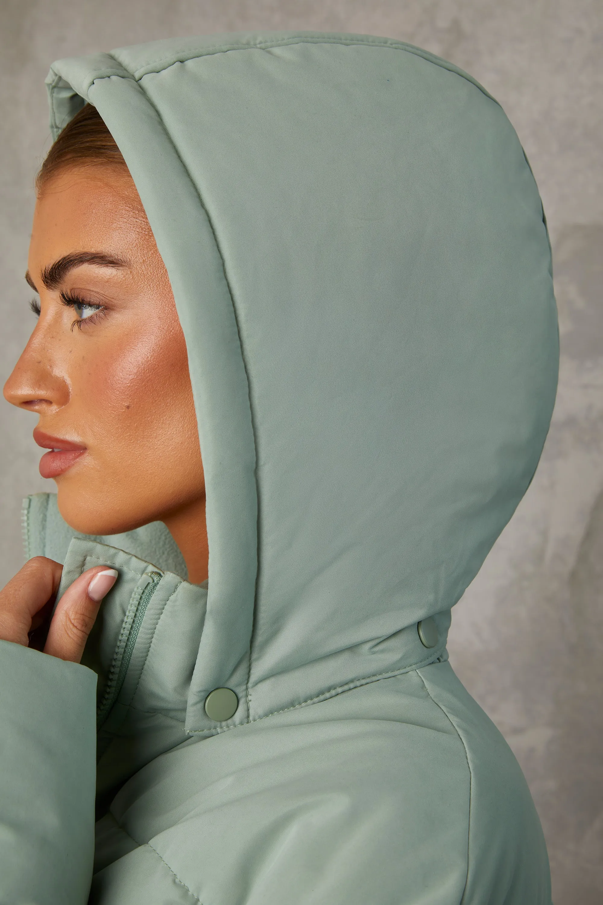 Mid Length Hooded Puffer Coat in Iceberg Green sold by Oh Polly product image thumbnail 4