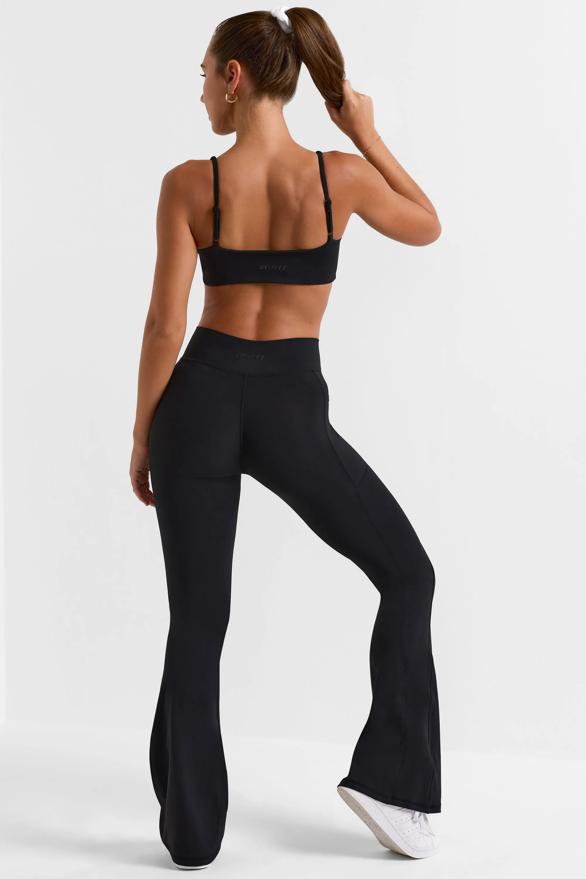 Soft Active V-Waist Pocket Flared Leggings in Black sold by Oh Polly product image thumbnail 2