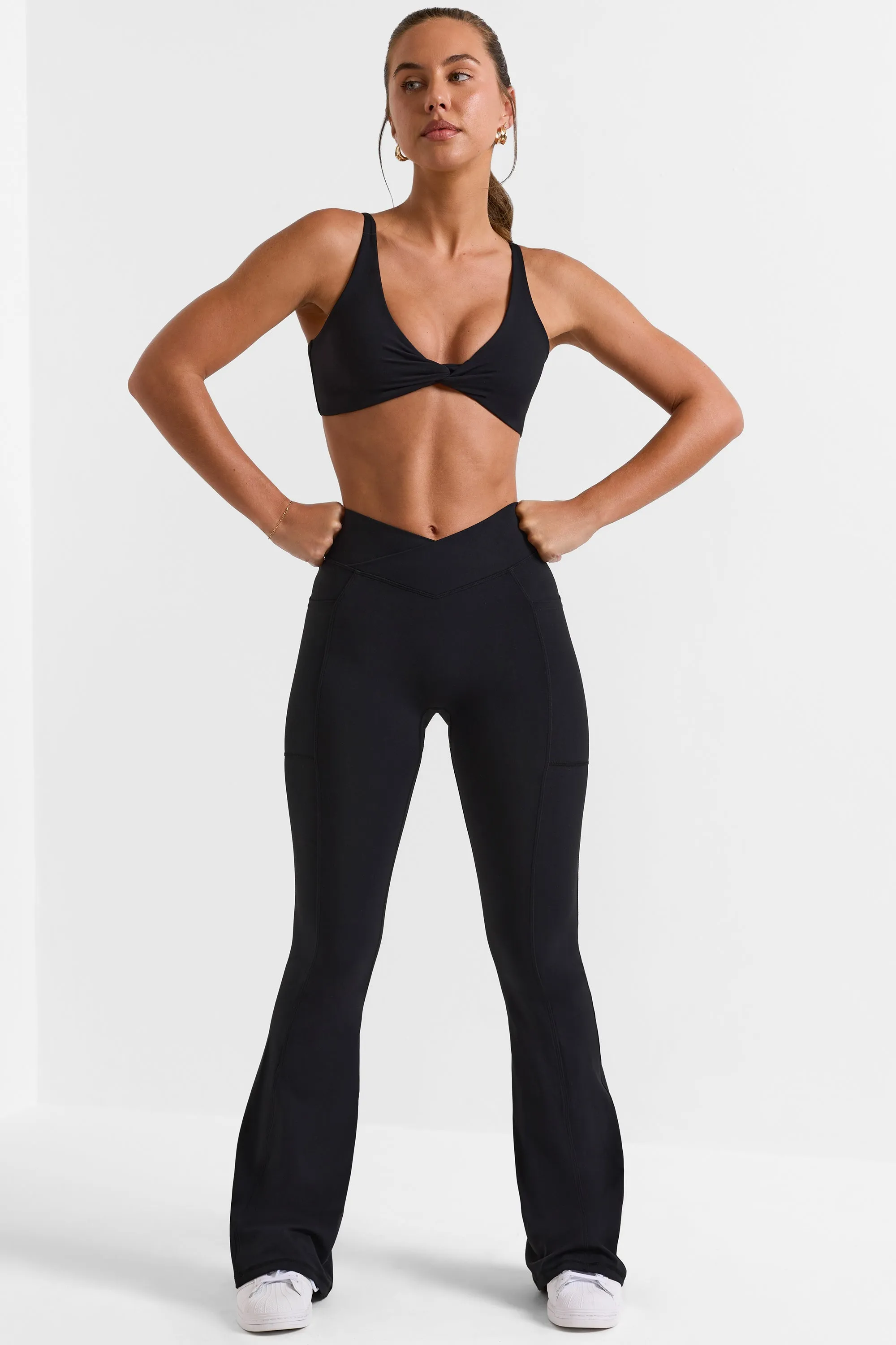 Soft Active V-Waist Pocket Flared Leggings in Black sold by Oh Polly product image thumbnail 4