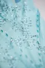 Embellished Mid-Rise Mini Skirt in Ice Blue sold by Oh Polly