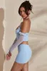 Long Sleeve Cowl Neck Corset Crop Top in Light Blue sold by Oh Polly