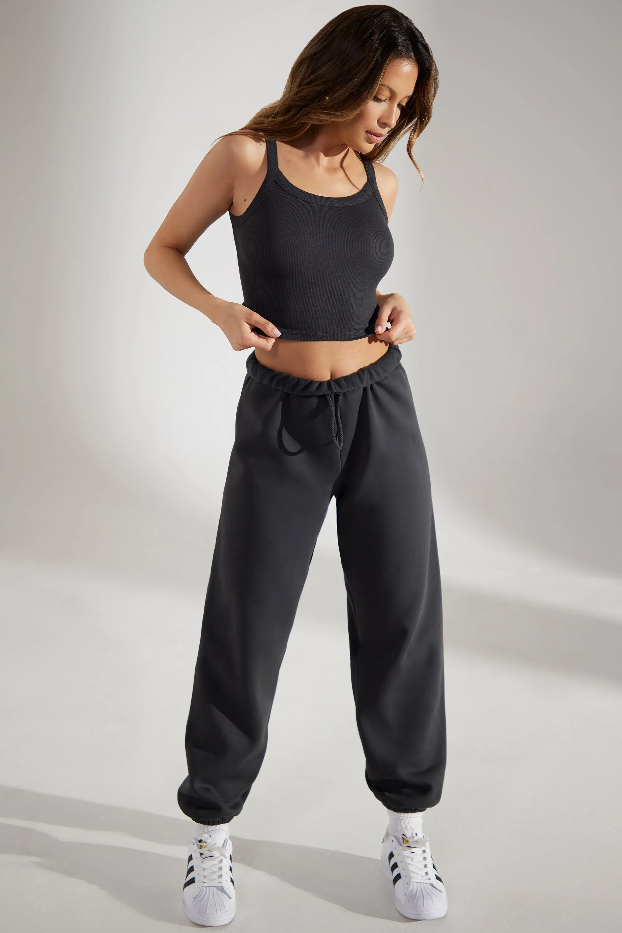 Oversized Joggers in Washed Black sold by Oh Polly