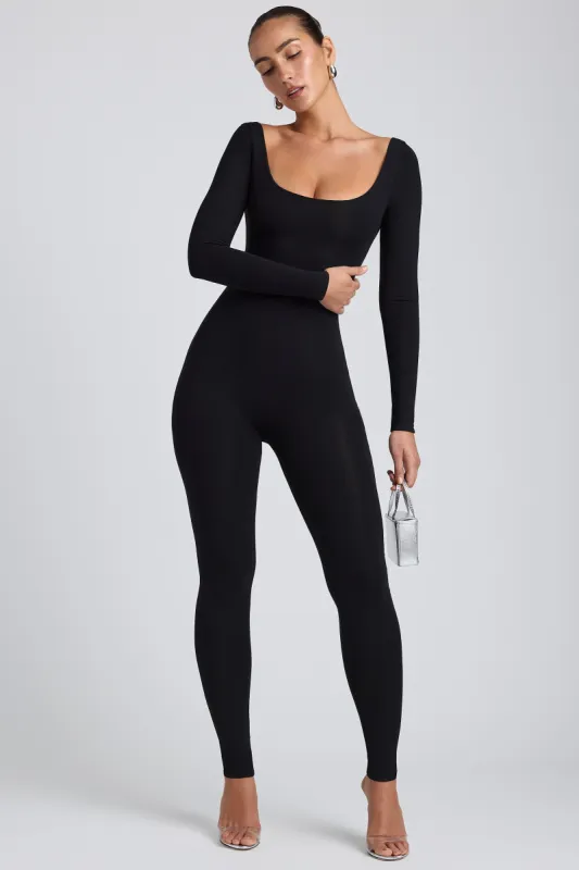 Modal Scoop-Neck Cross-Back Jumpsuit in Black sold by Oh Polly