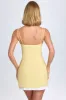 Bow-Detail Pleated Mini Dress in Pastel Yellow sold by Oh Polly