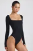 Ribbed Modal Long Sleeve Bodysuit in Black sold by Oh Polly