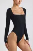 Ribbed Modal Long Sleeve Bodysuit in Black sold by Oh Polly