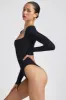 Ribbed Modal Long Sleeve Bodysuit in Black sold by Oh Polly
