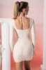 Long Sleeve Mini Dress in Stone sold by Oh Polly