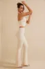 Tall High Waist Flare Trousers in Ivory sold by Oh Polly