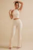 Tall High Waist Flare Trousers in Ivory sold by Oh Polly