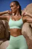 Scoop Neck Lace Up Back FlexiRib Sports Bra in Mint Green sold by Oh Polly