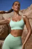 Scoop Neck Lace Up Back FlexiRib Sports Bra in Mint Green sold by Oh Polly
