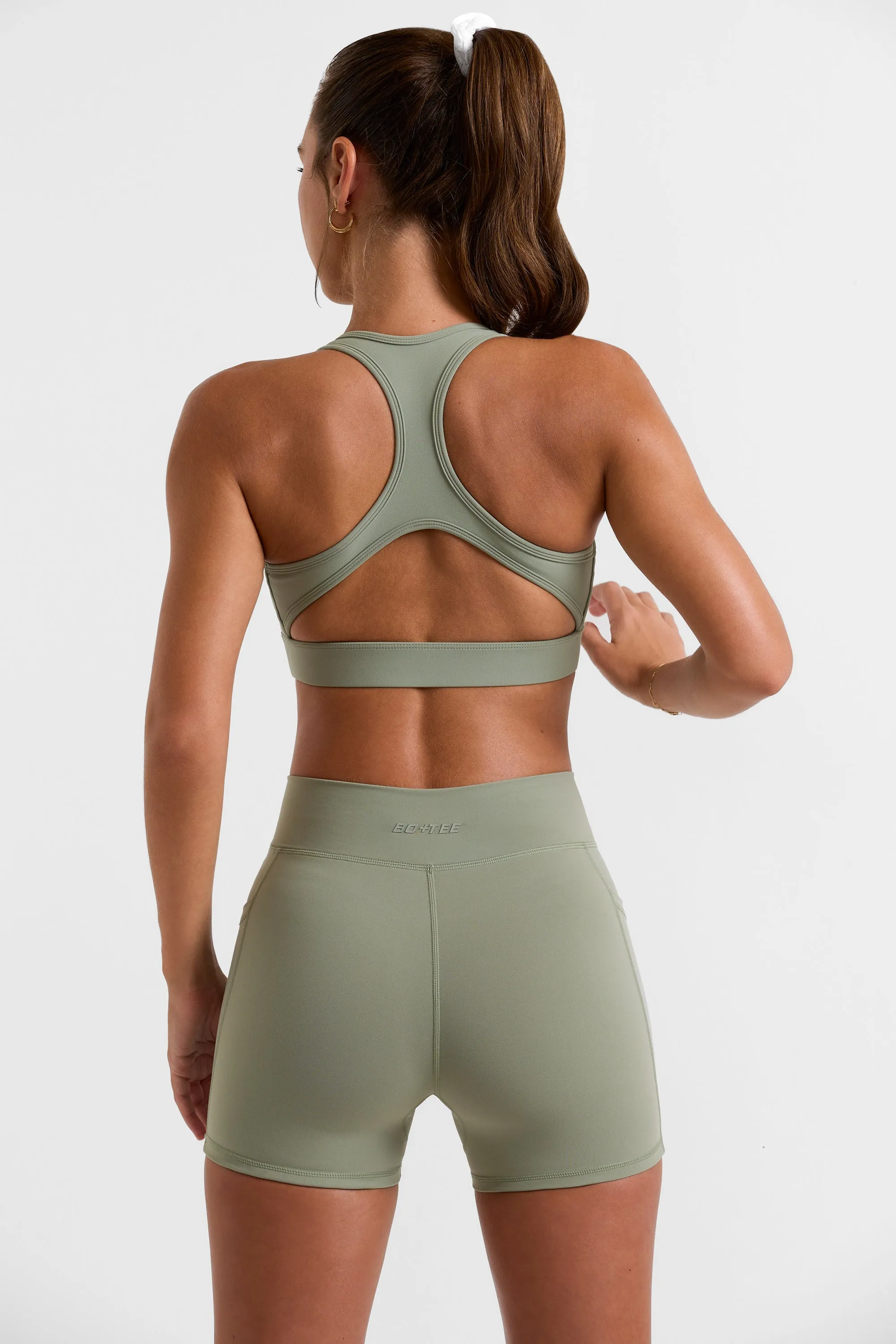 Cut Out Back Sports Bra in Bamboo Green sold by Oh Polly product image thumbnail 2